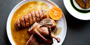 Wood-roasted half duck with burnt butter and mandarin is the go-to dish (roast pumpkin with coriander oil also pictured,top right).