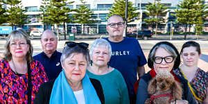 Sandra Severin (with blue scarf) and other Docklands residents oppose the development plan.