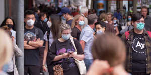 People wear face masks in Melbourne on January 4.