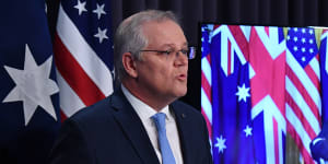 Heading towards an election,Scott Morrison gets to present himself as a national leader with a chair at the same table as US President Joe Biden. 