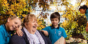 Resident and former teacher Christine Wright with Isaac Morrison,Jonathon Bateman and Tracian Ghirocian at Whiddon Easton Park retirement centre,in Glenfield. They love visiting their grandbuddy Christine.