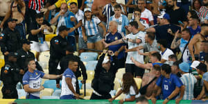 Violent clash between police,fans delays Brazil-Argentina clash