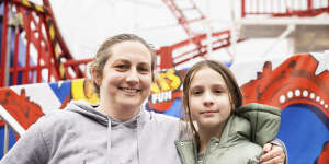 Megan Timms and her 12-year-old daughter Ruby Timms rode the Rebel Coaster after it reopened on Tuesday.