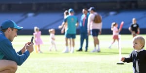 Pat Cummins with wife Becky and son Albie at the MCG on Christmas Day.