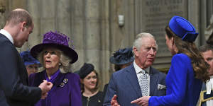 Prince William,left,and Catherine,right,talk with Prince Charles and Camilla,at the Commonwealth Day service at Westminster Abbey.