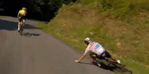 Vingegaard lets champion catch up after crash but still takes Tour’s final climb