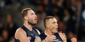 On song:Carlton’s Harry McKay,left,and Patrick Cripps celebrate.