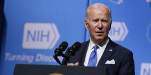 Biden steps up fight against Omicron as variant marches across globe