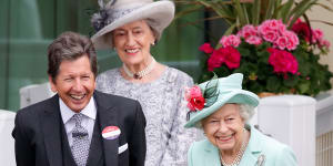 Lady-in-waiting Susan Hussey,standing behind the Queen and racing manager John Warren,at the Royal Ascot races in June 2021.