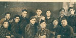 Phillip (at top row,far left) with the Balingen garage crew in May 1945,shortly after liberation and still wearing their prison camp uniforms. 