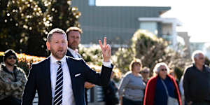 Auctioneer Ed Riley,of Riley Auctions,prepares to sell the Cabarita home for $4.72 million.