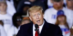 Ex-president Donald Trump speaking at a rally in Texas where he discussed pardoning convicted January insurrectionists. 