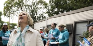 The independent candidate for Warringah,Zali Steggall,greets voters in Balgowlah on Saturday. 