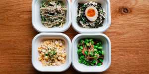 Clockwise from top left:Wakame bean sprout salad,potato salad with soft egg,glazed mushroom and edamame and seasoned sweet corn.
