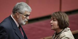 Senators Kim Carr and Kimberley Kitching in discussion during debate in March 2018.