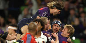 Melbourne Storm celebrate a try.