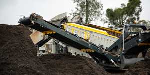 The mulch is screened using a machine which filters out pieces larger than two centimetres.