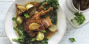 Braised duck with bacon,prunes and kale.