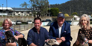 Deputy Premier Paul Toole,second left,with Greyhound Racing NSW chief executive Rob Macaulay,in Lithgow last week.