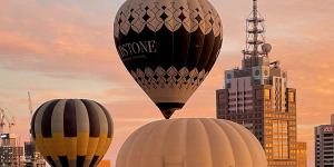 Hot air balloons flying over the Melbourne CBD in 2022.