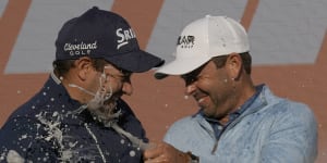 Hennie Du Plessis and Charl Schwartzel celebrate after their Stinger team took out the teams event.