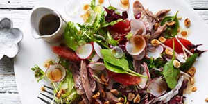 Duck salad with ruby grapefruit and hazelnuts.