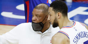 Sixers coach Doc Rivers speaks to Ben Simmons.