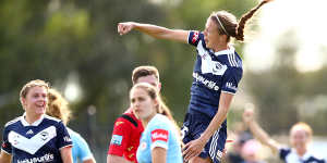 Melbourne Victory's Amy Jackson,right,celebrates a goal at CB Smith Reserve. 