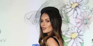 Changing tracks ... Nicole Trunfio in her third look for the day.