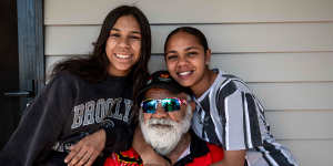Wilcannia elder William Murray,a signatory to the Uluru Statement from the Heart,with his granddaughters Kyanna (left) and Temmiah (right). 