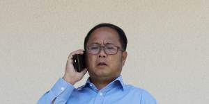 Chinese political donor Huang Xiangmo on the balcony of his Mosman mansion last year.