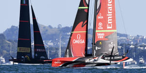 Italy’s Luna Rossa,left,races against Team New Zealand during race six.