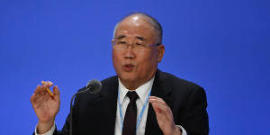 China’s special climate envoy,Xie Zhenhua,speaks at the COP26 climate change conference.