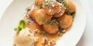 Loukoumades doused in a sugar syrup,along with a scoop of salted caramel ice cream. 