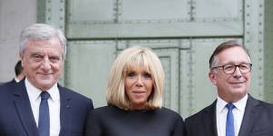 Francois-Henri Pinault,CEO of luxury group Kering,left,Brigitte Macron wife of French President Emmanuel Macron,center,and Bruno Pavlovsky president of Chanel arrive at the event.