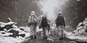 Ukrainian soldiers walks at the line of separation from pro-Russian rebels near Katerinivka,Donetsk region,Ukraine.