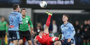 Acrobatics:Adrian Luna Retamar of Melbourne City executes a scissor-kick.