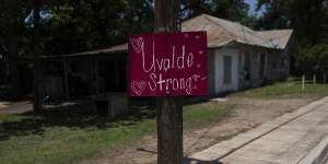 A “Uvalde Strong” sign is posted on an electric pole in Uvalde,Texas.