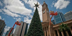 Brisbane Christmas tree lights up King George Square as big crowd gathers