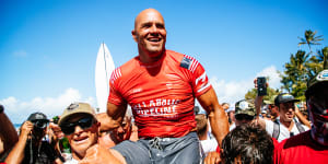 Kelly Slater celebrates his 2022 Pipeline Pro victory,a week short of his 50th birthday.