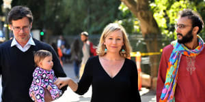 Cr Jonathan Sri accompanies Larissa Waters,her partner Jeremy Gates and daughter Alia Joy,to announce her resignation as a Greens senator.