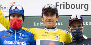 Richie Porte,right,with teammate Geraint Thomas,centre,who he will support in a Tour de France title bid this year. 