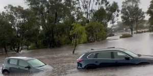 ‘Street like a river’:Perth residents retreat as others hit the kayak