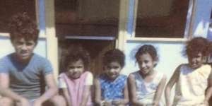 Sam Backo as a nine-year-old,pictured&nbsp;with his four sisters.