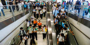 School students returning to Shenzhen from Hong Kong on Thursday afternoon. 