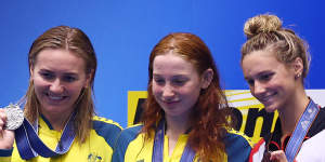 Titmus with training partner Mollie O’Callaghan (middle) and Canadian gun Summer McIntosh (right),all pictured at the 2023 World Championships.