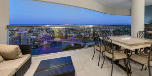 Peter and Kirilly bought a $2.7 million pad in Brisbane’s Riparian Plaza last year.