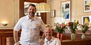 Manu Feildel with Laundy Hotel’s group executive chef Jamie Gannon.