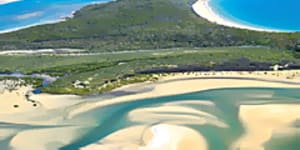 Unique ... an aerial view of the township of 1770 and its surrounding coastline.