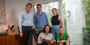 Ryan with husband Peter Jordan,stepchildren Campbell and Annabel,son Patrick and cavoodle Alfie.